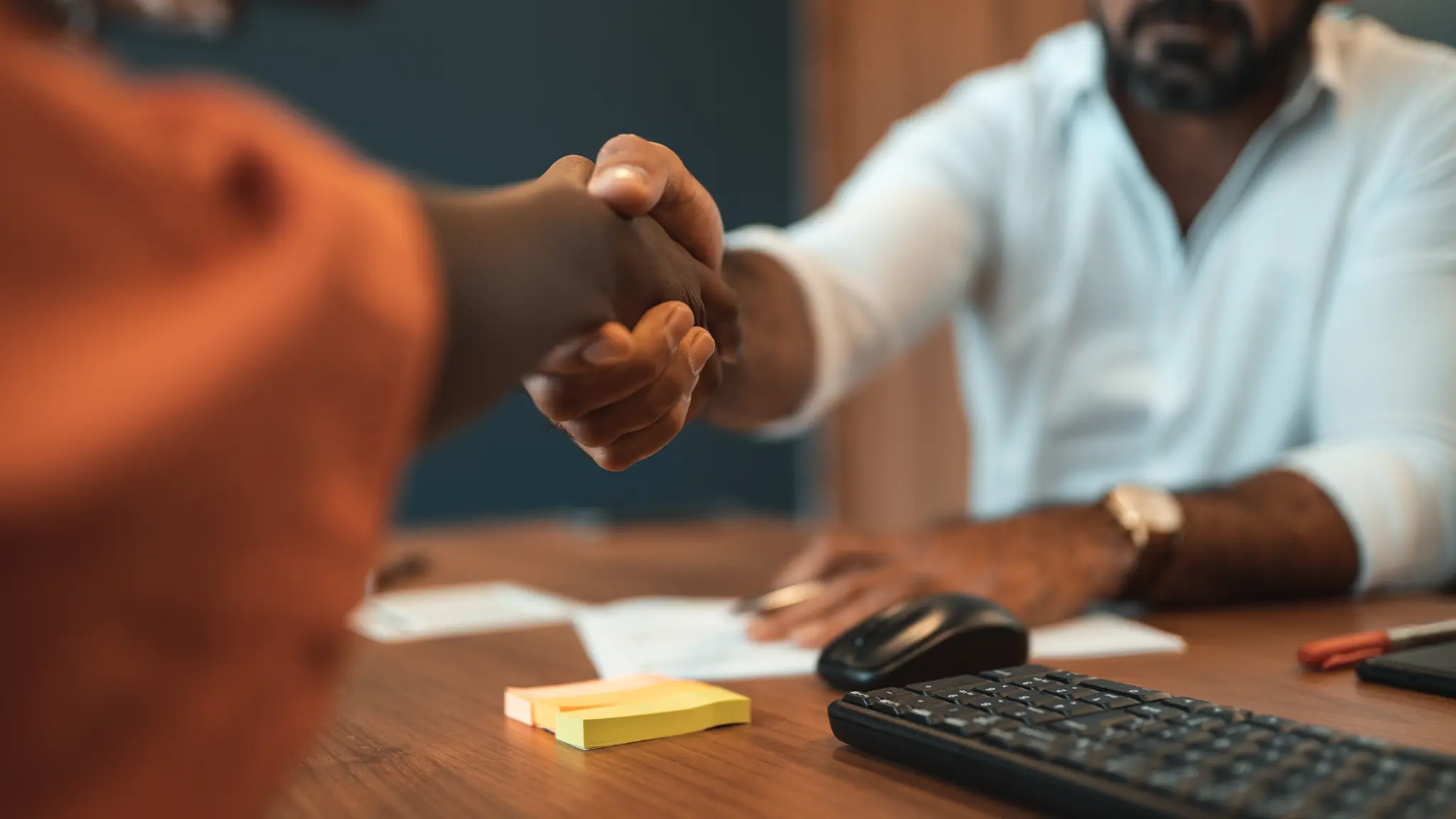 A close-up of people shaking hands