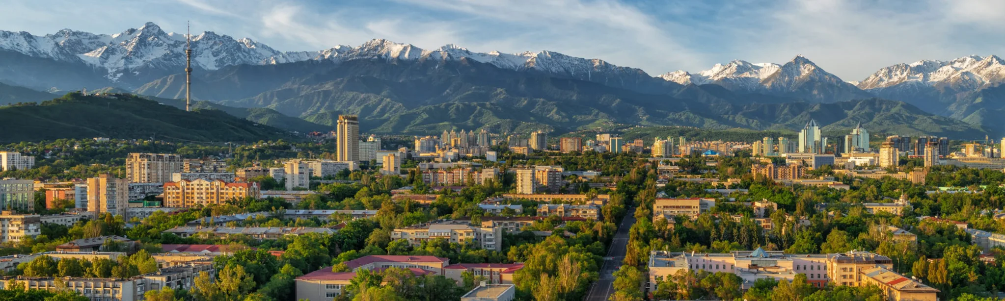 City of Kyrgyzstan with majestic mountains in the background.
