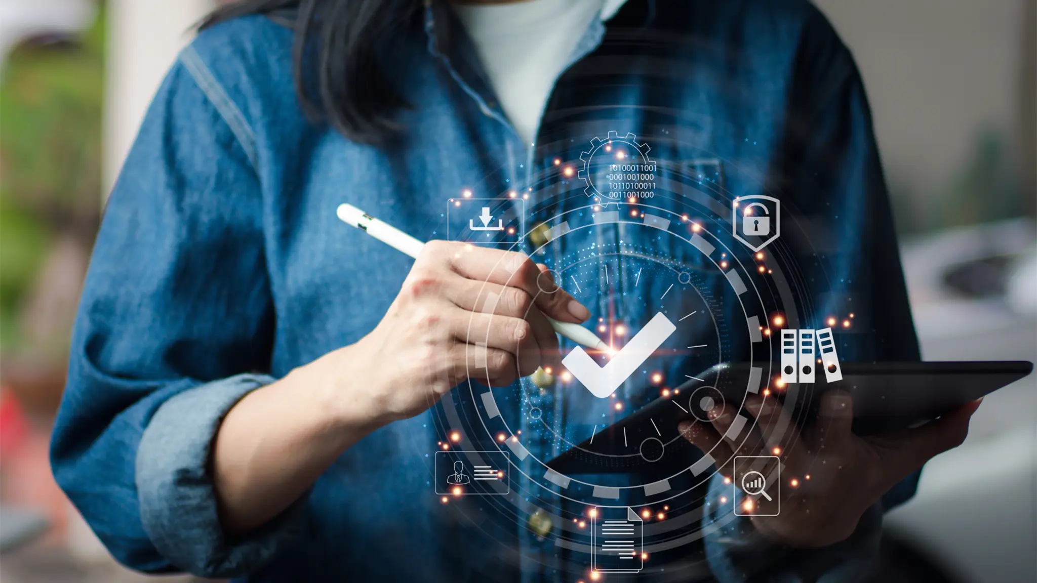 A student holding a pen and a check mark