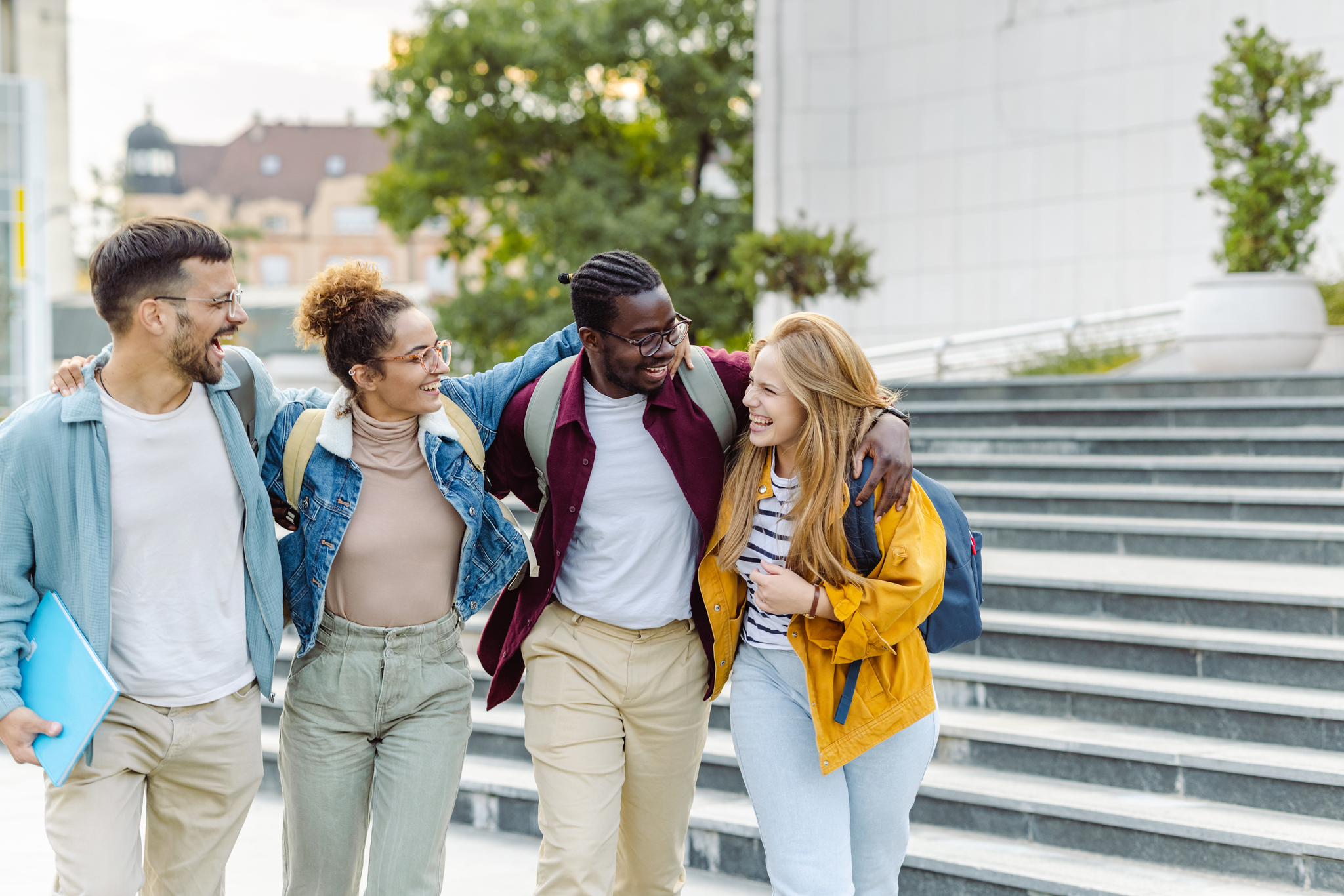 A group of students outside a business school